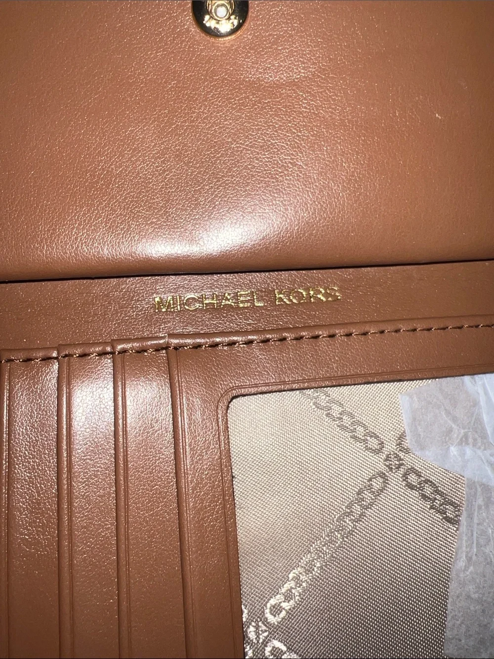 Michael Kors Orange Monogram Stripe Zip Wristlet